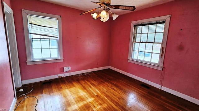 380 Hobson Ave, Hampton, VA 23661 - spare room featuring wood-type flooring, a ceiling fan, baseboards, and visible vents
