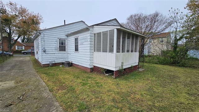 380 Hobson Ave, Hampton, VA 23661 - exterior space featuring a lawn and a sunroom
