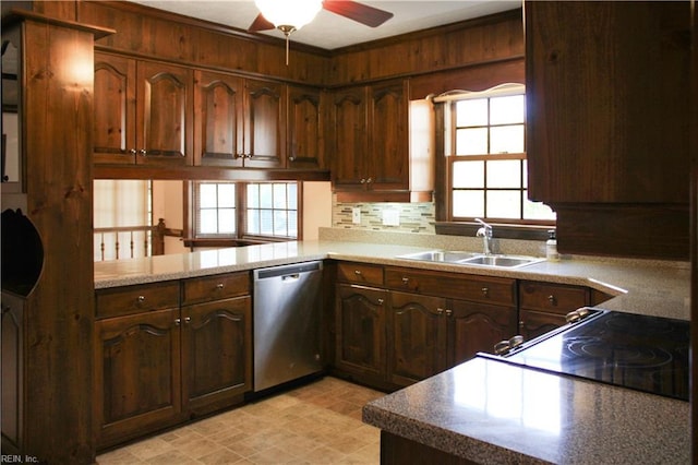 kitchen with tasteful backsplash, crown molding, a sink, dishwasher, and a ceiling fan