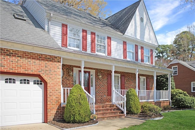 view of front of house featuring concrete driveway, brick siding, a garage, a shingled roof, and a porch