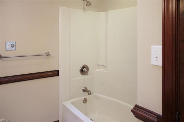 bathroom featuring  shower combination