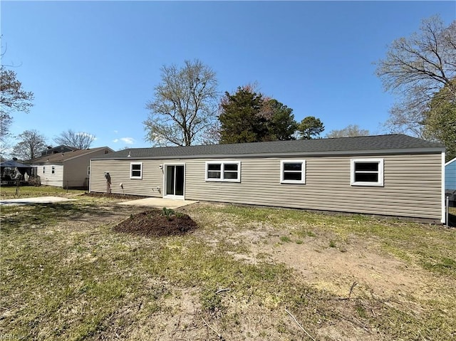 rear view of house with a patio area