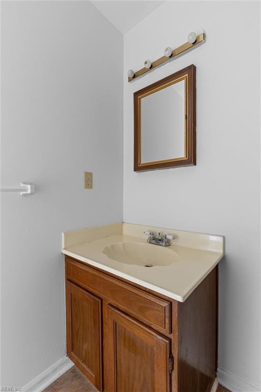 724 Oleander Cir, Virginia Beach, VA 23464 - bathroom with baseboards and vanity