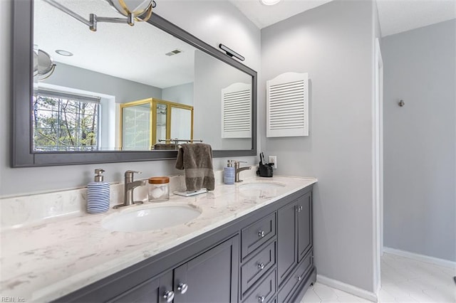 full bathroom with baseboards, visible vents, a sink, and double vanity