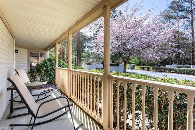 balcony featuring a porch