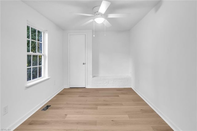 1438 Lasalle Ave, Portsmouth, VA 23704 - spare room featuring visible vents, baseboards, light wood finished floors, and ceiling fan