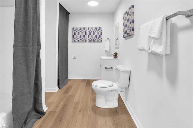 1438 Lasalle Ave, Portsmouth, VA 23704 - full bath featuring baseboards, toilet, wood finished floors, and vanity