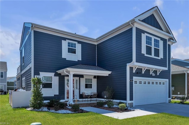 view of front of property featuring board and batten siding, covered porch, a front yard, a garage, and driveway