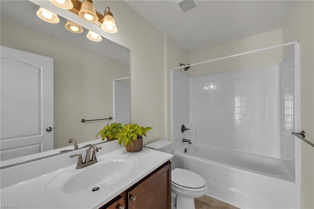 full bathroom featuring vanity, tile patterned flooring, visible vents, toilet, and shower / bathing tub combination