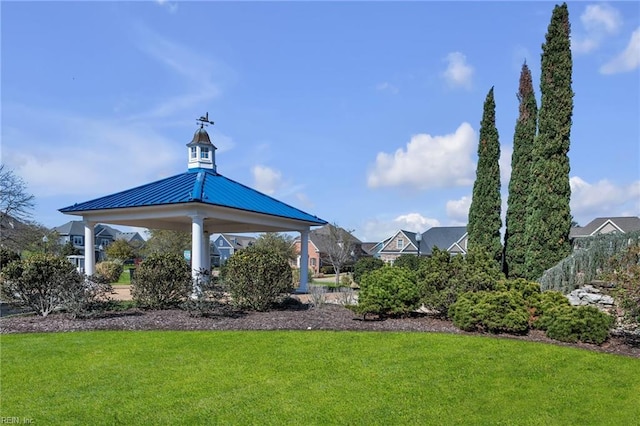 view of home's community featuring a gazebo and a lawn