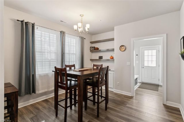 1012 Chartwell Dr, Newport News, VA 23608 - dining area with baseboards, a chandelier, and dark wood finished floors