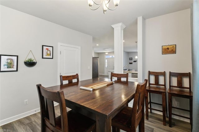 1012 Chartwell Dr, Newport News, VA 23608 - dining area with ornate columns, baseboards, and wood finished floors