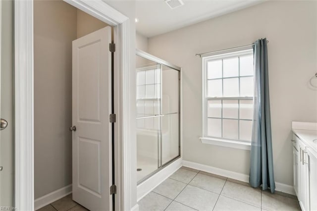 1012 Chartwell Dr, Newport News, VA 23608 - full bathroom featuring a stall shower, baseboards, tile patterned flooring, and vanity