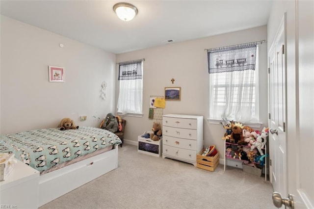 1012 Chartwell Dr, Newport News, VA 23608 - bedroom featuring baseboards, carpet floors, visible vents, and multiple windows