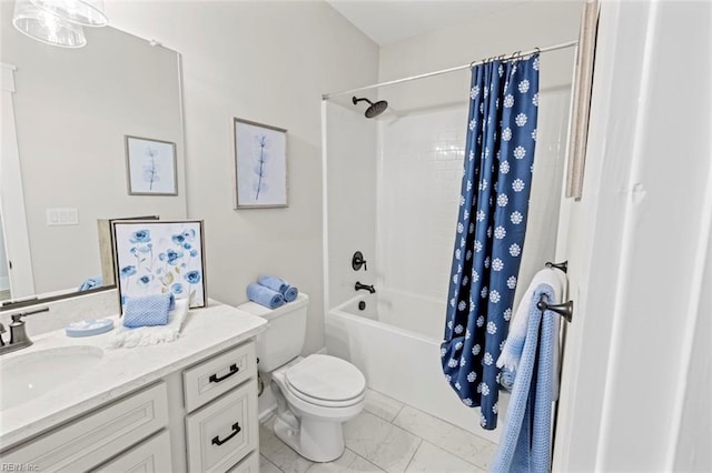 bathroom featuring marble finish floor, toilet, vanity, and shower / tub combo