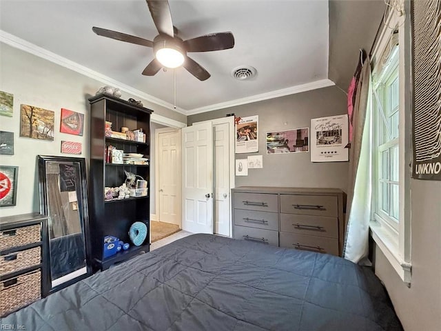 bedroom featuring visible vents, ceiling fan, and ornamental molding