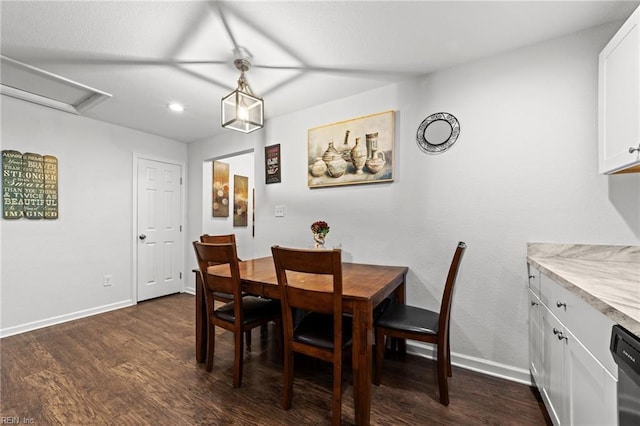 dining area featuring recessed lighting, dark wood-style floors, baseboards, and attic access
