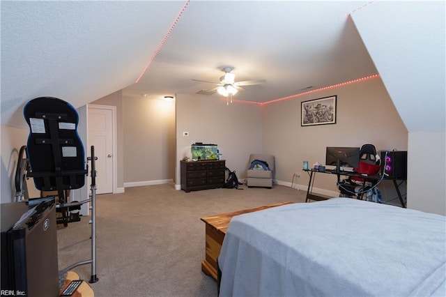 carpeted bedroom with baseboards and a ceiling fan