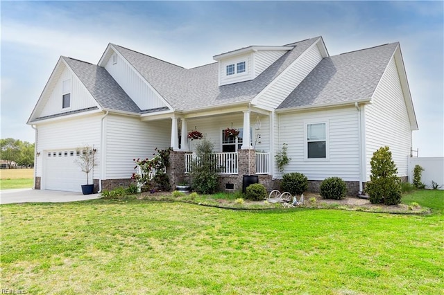 view of front of home featuring a front yard, a porch, and driveway