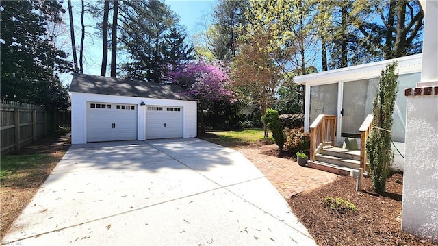 detached garage with fence