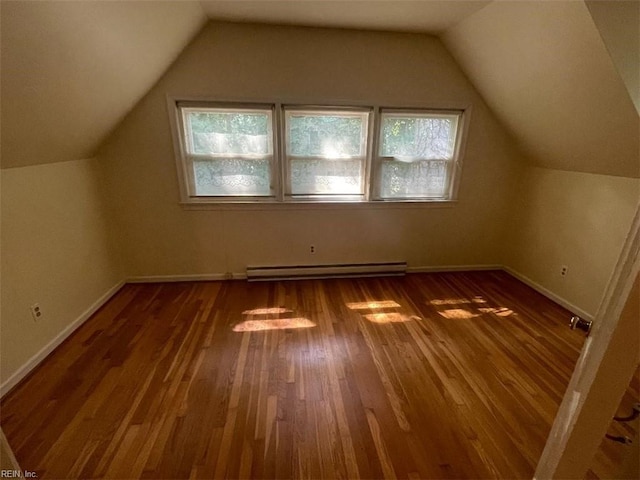 418 Pin Oak Rd, Newport News, VA 23601 - additional living space featuring dark wood-style floors, baseboard heating, baseboards, and vaulted ceiling