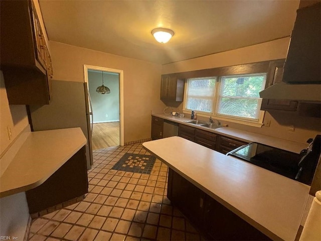 418 Pin Oak Rd, Newport News, VA 23601 - kitchen featuring light countertops, stainless steel appliances, range hood, a sink, and a peninsula
