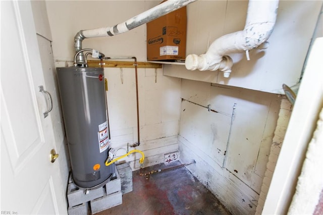 utility room featuring gas water heater