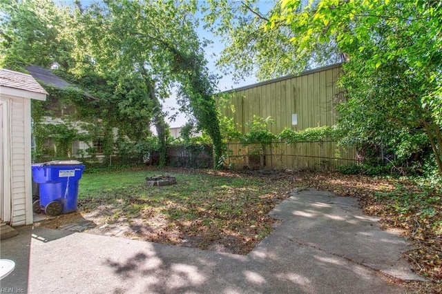 view of yard with a patio and fence