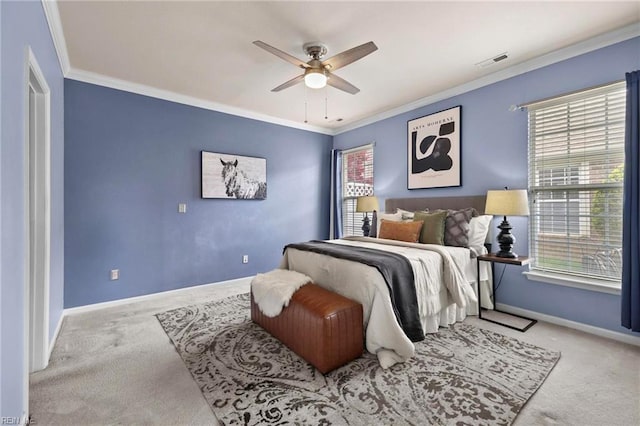 bedroom with carpet flooring, crown molding, and visible vents