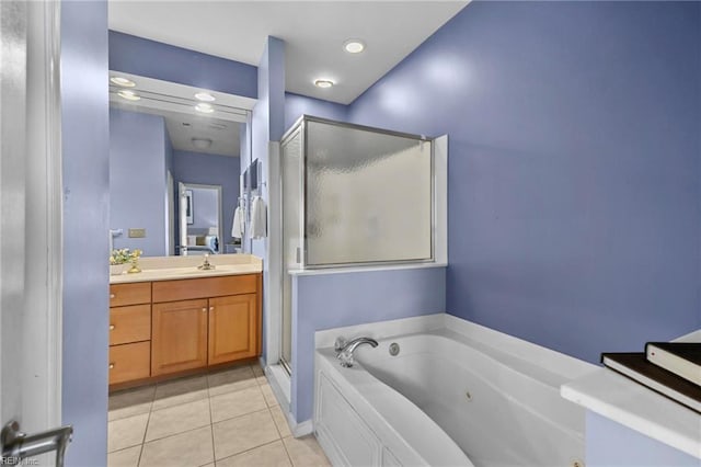 bathroom featuring a tub with jets, tile patterned floors, vanity, and a shower stall