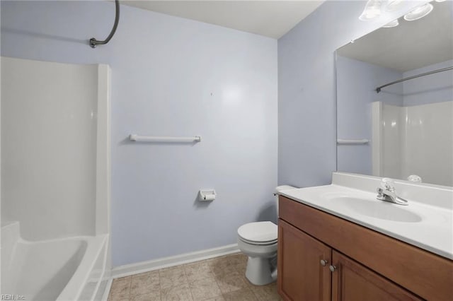 bathroom featuring baseboards, bathtub / shower combination, toilet, and vanity