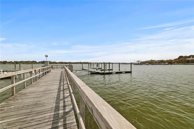 view of dock with a water view