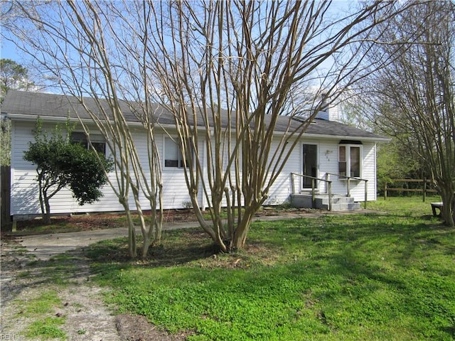 156 Burford Ave, Virginia Beach, VA 23451 - view of front of home with a chimney and a front yard