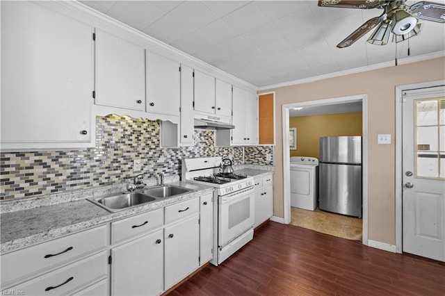 1917 Kensington Dr, Hampton, VA 23663 - kitchen featuring white gas stove, washer / clothes dryer, under cabinet range hood, a sink, and freestanding refrigerator