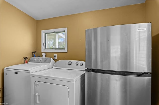 1917 Kensington Dr, Hampton, VA 23663 - clothes washing area featuring washer and clothes dryer and laundry area