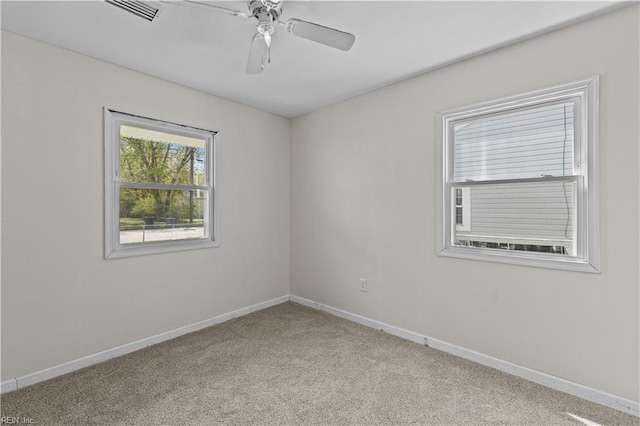 1917 Kensington Dr, Hampton, VA 23663 - carpeted empty room with baseboards, visible vents, and a ceiling fan