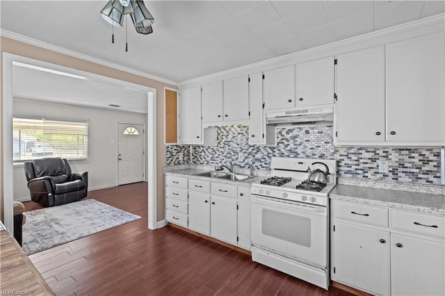 1917 Kensington Dr, Hampton, VA 23663 - kitchen with decorative backsplash, white cabinets, dark wood finished floors, under cabinet range hood, and white gas range oven