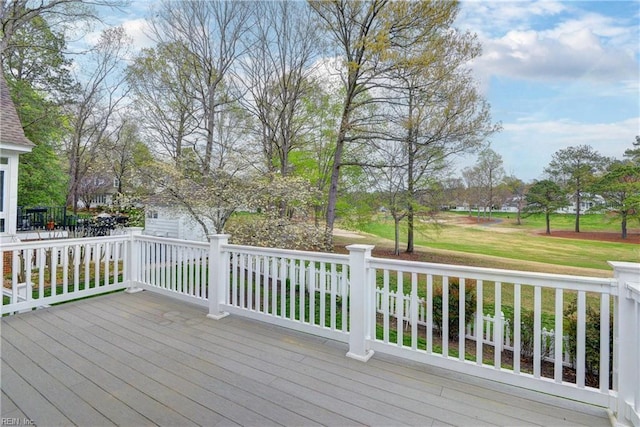 deck featuring a yard