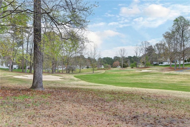 surrounding community with a yard