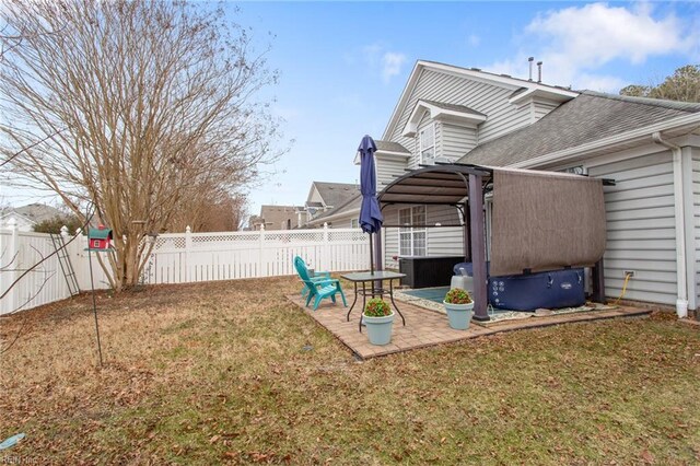 view of yard with a fenced backyard and a patio