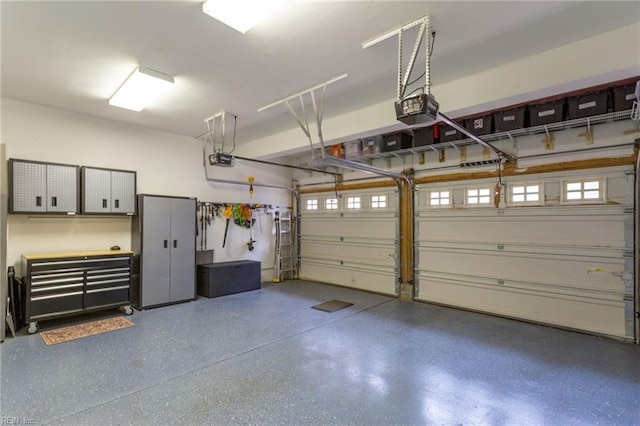 garage featuring a garage door opener