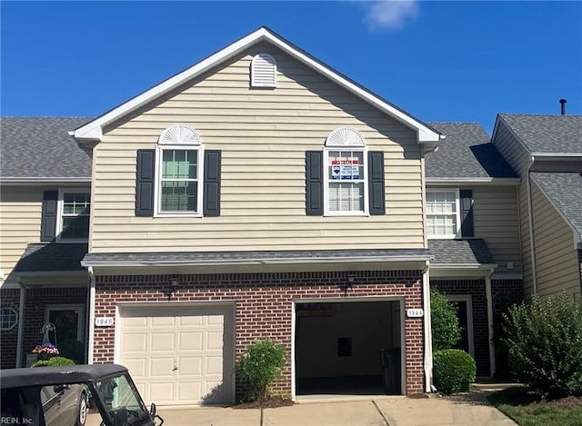 3844 Cromwell Ln, Williamsburg, VA 23185 - view of front of home with an attached garage, driveway, and brick siding