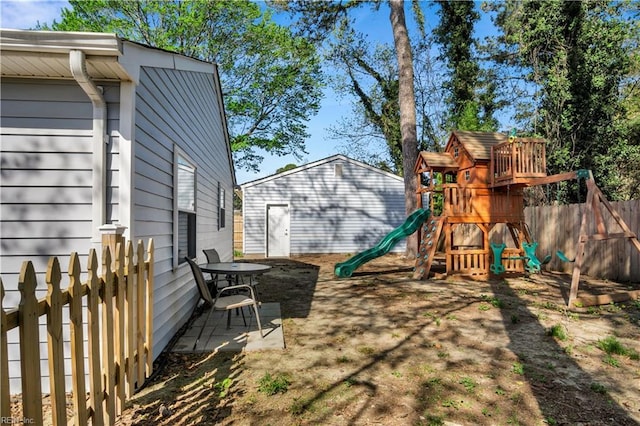 exterior space featuring fence and a patio