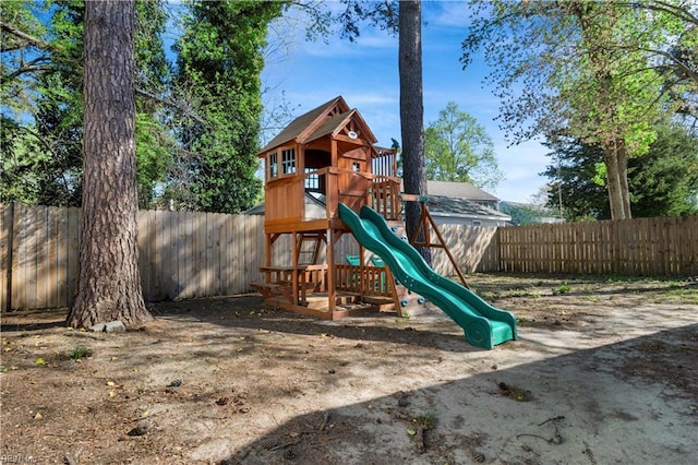 view of jungle gym featuring a fenced backyard