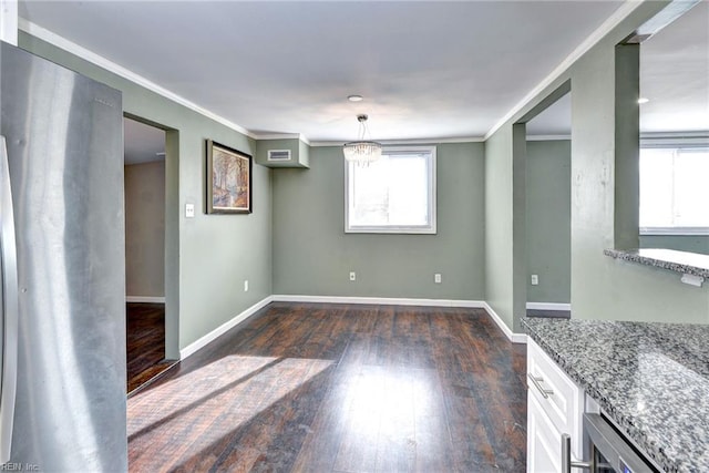1413 Seward Dr, Hampton, VA 23663 - interior space featuring baseboards, visible vents, ornamental molding, and dark wood-style flooring