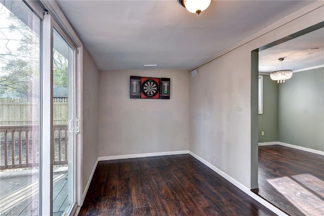 1413 Seward Dr, Hampton, VA 23663 - empty room with baseboards, wood finished floors, and a chandelier