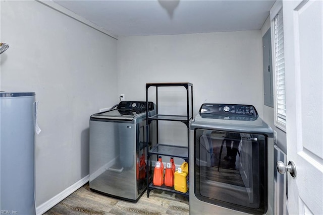 1413 Seward Dr, Hampton, VA 23663 - washroom featuring water heater, baseboards, washer and dryer, laundry area, and wood finished floors
