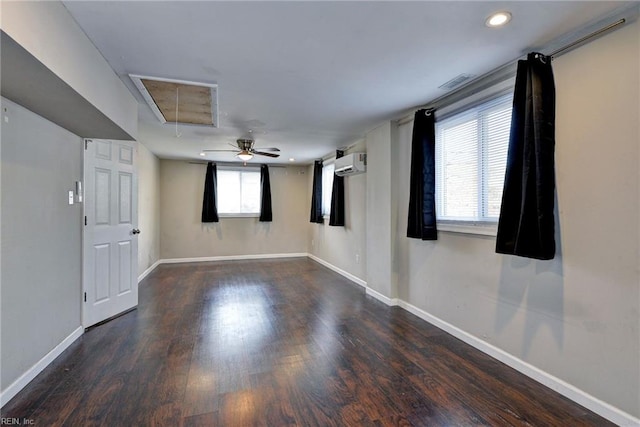 1413 Seward Dr, Hampton, VA 23663 - empty room featuring a wall mounted AC, attic access, wood finished floors, baseboards, and recessed lighting