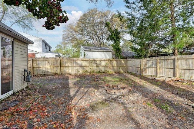 1413 Seward Dr, Hampton, VA 23663 - view of yard featuring a fenced backyard and a fire pit