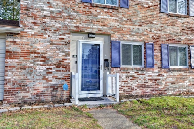 1413 Seward Dr, Hampton, VA 23663 - property entrance featuring brick siding